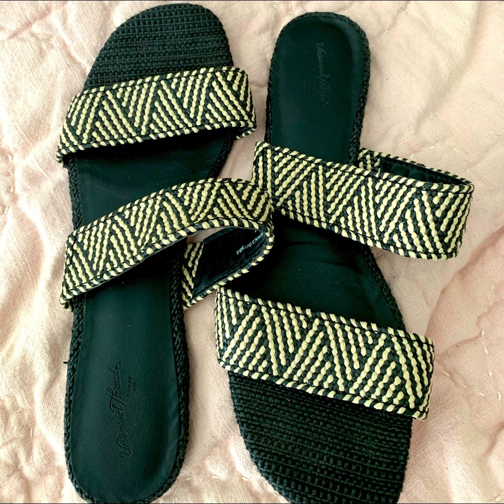 Universal Thread flats with black and cream striped straps. Size 10